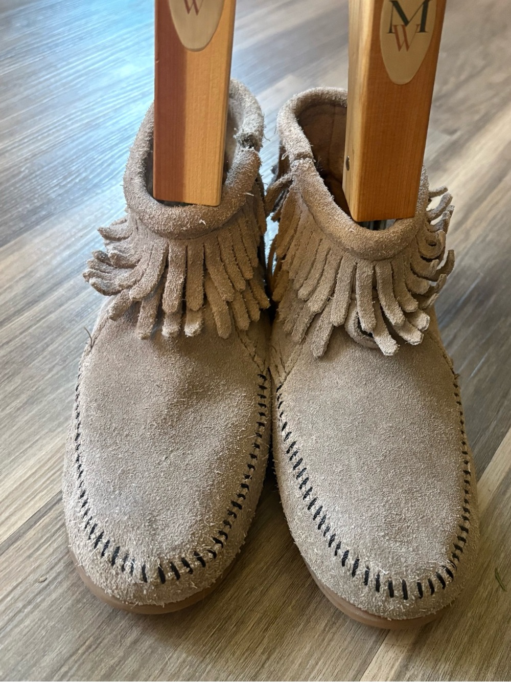 Minnetonka Kids Suede Fringe Moccasins in Gray.